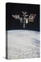 The International Space Station in Orbit Above Earth-null-Stretched Canvas