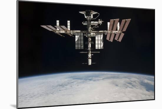 The International Space Station in Orbit Above Earth-null-Mounted Photographic Print