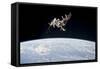 The International Space Station in Orbit Above Earth-null-Framed Stretched Canvas