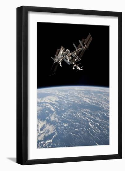 The International Space Station in Orbit Above Earth-null-Framed Photographic Print