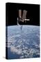 The International Space Station in Orbit Above Earth-null-Stretched Canvas