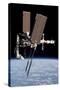 The International Space Station in Orbit Above Earth-null-Stretched Canvas