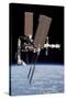 The International Space Station in Orbit Above Earth-null-Stretched Canvas