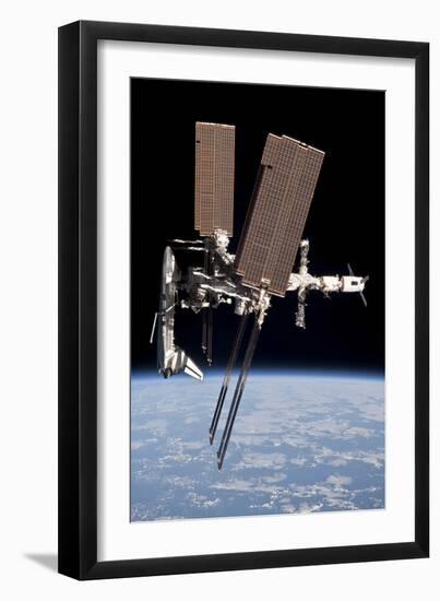 The International Space Station in Orbit Above Earth-null-Framed Photographic Print