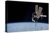 The International Space Station in Orbit Above Earth-null-Stretched Canvas