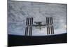 The International Space Station in Orbit Above Earth-null-Mounted Photographic Print