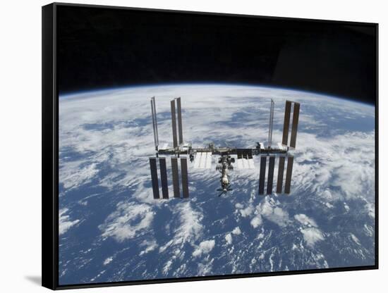 The International Space Station in Orbit Above the Earth-null-Framed Stretched Canvas