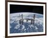 The International Space Station in Orbit Above the Earth-null-Framed Photographic Print