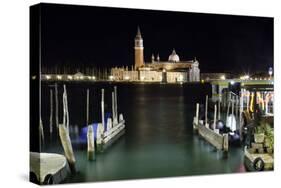 The Island and Church of San Georgio Maggiore at Night with a Boat Dock in the Foreground, Venice-Sean Cooper-Stretched Canvas