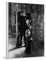 The Kid, Tom Wilson, Charles Chaplin, Jackie Coogan, 1921-null-Framed Photo