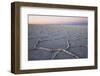 The largest salt flats in the world located in Uyuni, bolivia as the sun is rising in winter.-Mallorie Ostrowitz-Framed Photographic Print