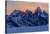 The last rays of sunset hit the Grand Teton on a winter evening-Tim Laman-Stretched Canvas