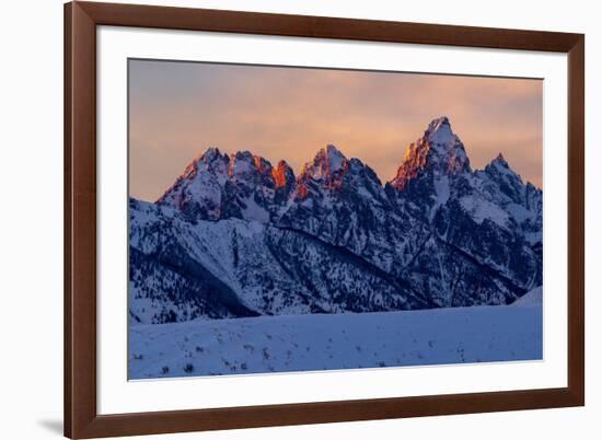 The last rays of sunset hit the Grand Teton on a winter evening-Tim Laman-Framed Photographic Print