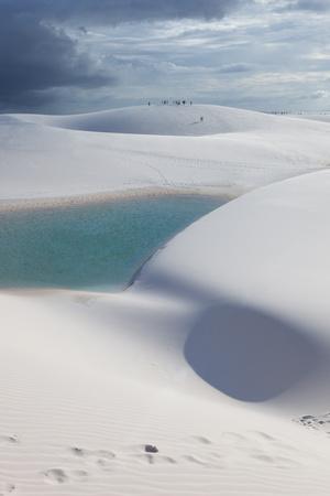https://imgc.allpostersimages.com/img/posters/the-lencois-maranhenses-sand-dunes-and-lagoons-at-sunset-in-maranhao-state-brazil_u-L-Q135X4N0.jpg?artPerspective=n