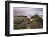 The lighthouse at the edge of Llanddwyn Islan, under a pink cloudy sky, Anglesey, Wales, United Kin-Stephen Spraggon-Framed Photographic Print