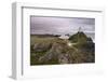 The lighthouse at the edge of Llanddwyn Islan, under a pink cloudy sky, Anglesey, Wales, United Kin-Stephen Spraggon-Framed Photographic Print