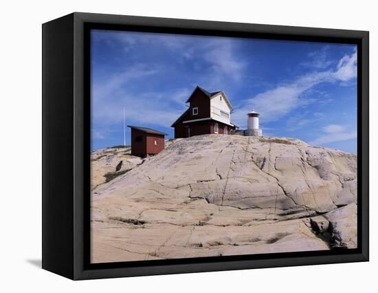 The Lighthouse on Stora Svangen, off the Island of Reso, Bohuslan, Sweden, Scandinavia-Kim Hart-Framed Stretched Canvas