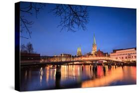 The Lights of Dusk on Typical Bridge and the Cathedral Reflected in River Trave, Lubeck-Roberto Moiola-Stretched Canvas