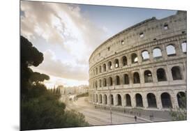 The lights of sunrise frame the ancient Colosseum (Flavian Amphitheatre), UNESCO World Heritage Sit-Roberto Moiola-Mounted Premium Photographic Print