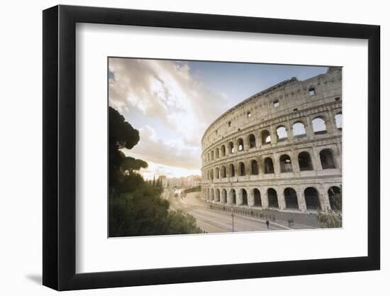 The lights of sunrise frame the ancient Colosseum (Flavian Amphitheatre), UNESCO World Heritage Sit-Roberto Moiola-Framed Photographic Print