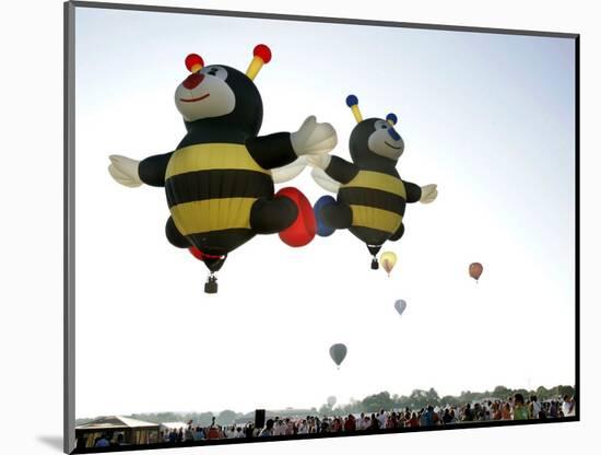 The Little Bees, a Pair of Specialty Designed Hot Air Balloons-null-Mounted Photographic Print