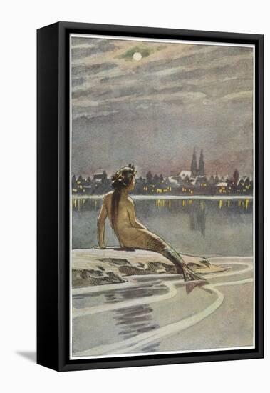 The Little Mermaid Sits on a Rock and Gazes at the Lights of the Distant Town-Paul Hey-Framed Stretched Canvas