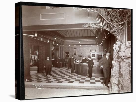 The Lobby and Registration Desk at the Hotel Victoria, 1900 or 1901-Byron Company-Stretched Canvas