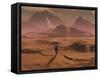 The Lone Figure of an Explorer Watching the Sandfalls of a Barren Planet-Stocktrek Images-Framed Stretched Canvas