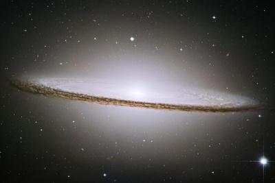 https://imgc.allpostersimages.com/img/posters/the-majestic-sombrero-galaxy-m104-space-photo_u-L-Q19E47X0.jpg?artPerspective=n