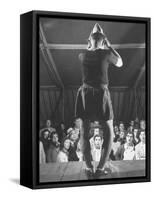 The Man from Mars Demonstrating How His Head Has Grown Since Entering the Army at Beginning of War-Cornell Capa-Framed Stretched Canvas