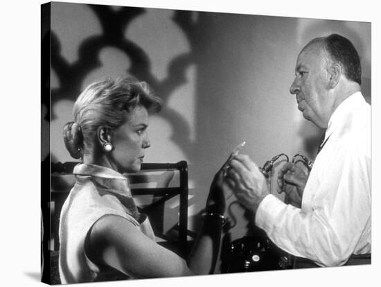 THE MAN WHO KNEW TOO MUCH, 1956 On the set, Alfred Hitchcock directs Doris Day (b/w photo)-null-Stretched Canvas