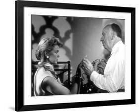 THE MAN WHO KNEW TOO MUCH, 1956 On the set, Alfred Hitchcock directs Doris Day (b/w photo)-null-Framed Photo