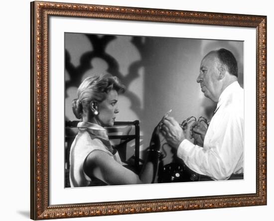 THE MAN WHO KNEW TOO MUCH, 1956 On the set, Alfred Hitchcock directs Doris Day (b/w photo)-null-Framed Photo