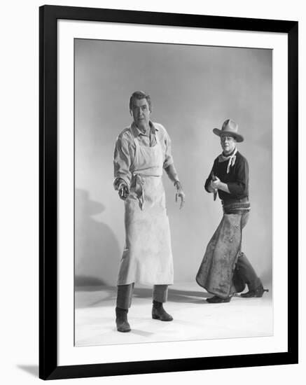 THE MAN WHO SHOT LIBERTY VALANCE, 1962 directed by JOHN FORD James Stewart and John Wayne (b/w phot-null-Framed Photo
