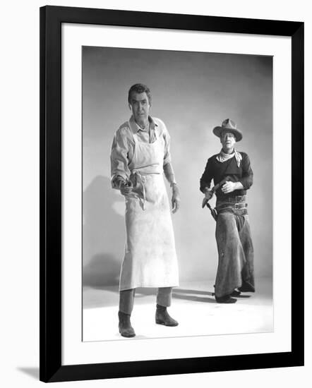 THE MAN WHO SHOT LIBERTY VALANCE, 1962 directed by JOHN FORD James Stewart and John Wayne (b/w phot-null-Framed Photo