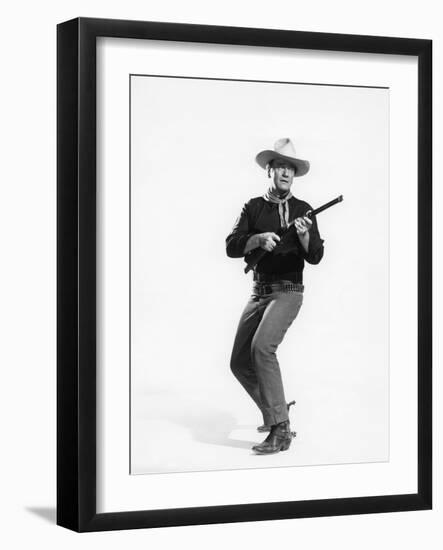 THE MAN WHO SHOT LIBERTY VALANCE, 1962 directed by JOHN FORD John Wayne (b/w photo)-null-Framed Photo