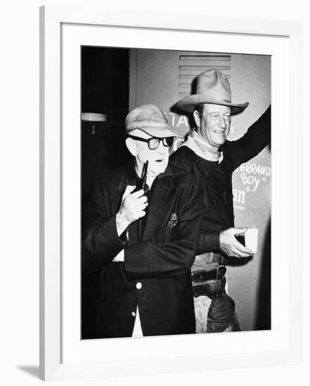 THE MAN WHO SHOT LIBERTY VALANCE, 1962 directed by JOHN FORD On the set, John Ford with John Wayne -null-Framed Photo