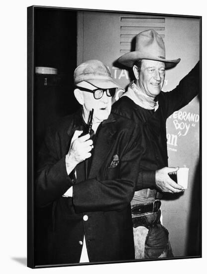 THE MAN WHO SHOT LIBERTY VALANCE, 1962 directed by JOHN FORD On the set, John Ford with John Wayne -null-Framed Photo