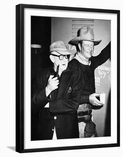 THE MAN WHO SHOT LIBERTY VALANCE, 1962 directed by JOHN FORD On the set, John Ford with John Wayne -null-Framed Photo