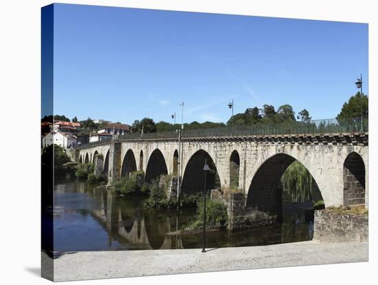 The Medieval Arched Stone Bridge across the River Lima at the Town of Ponte Da Barca, Minho, Portug-Stuart Forster-Stretched Canvas