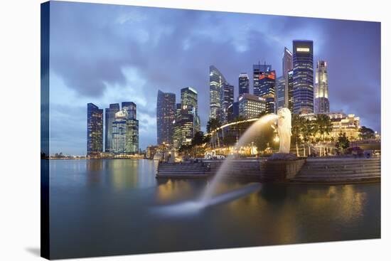 The Merlion Statue with the City Skyline in the Background-Gavin Hellier-Stretched Canvas