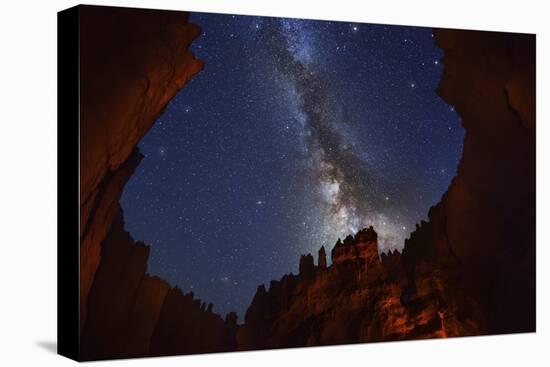 The Milky Way over Bryce Canyon.-Jon Hicks-Stretched Canvas