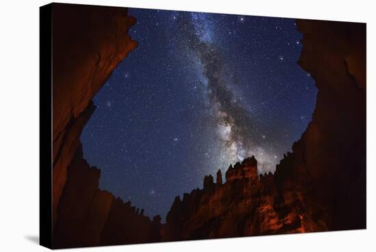The Milky Way over Bryce Canyon.-Jon Hicks-Stretched Canvas