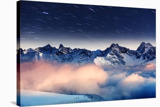 The Milky Way over the Winter Mountains Landscape. Europe. Creative Collage. Beauty World.-Leonid Tit-Stretched Canvas