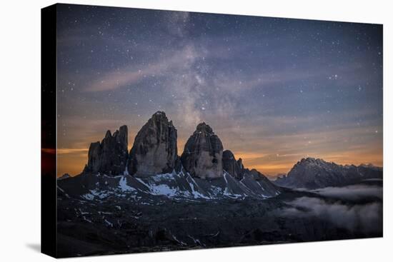 The Milky Way with its Stars Appear in a Summer Night on the Three Peaks of Lavaredo. Dolomites-ClickAlps-Stretched Canvas