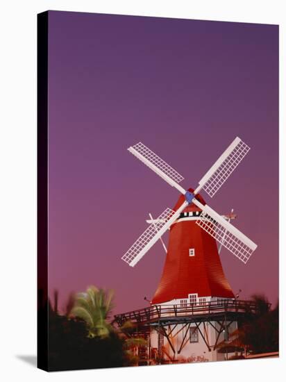 The Mill Resort Against Pink Sky, Oranjestad, Aruba-Stuart Westmoreland-Stretched Canvas