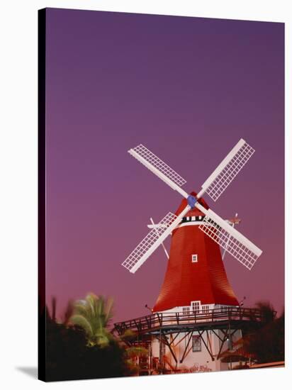 The Mill Resort Against Pink Sky, Oranjestad, Aruba-Stuart Westmoreland-Stretched Canvas