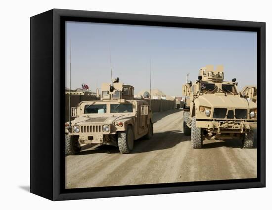 The Mine Resistant Ambush Protected All Terrain Vehicle and its Predecessor, the Humvee-null-Framed Stretched Canvas