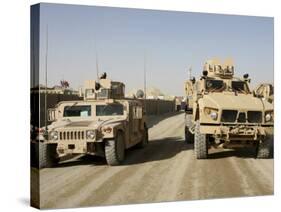 The Mine Resistant Ambush Protected All Terrain Vehicle and its Predecessor, the Humvee-null-Stretched Canvas