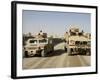 The Mine Resistant Ambush Protected All Terrain Vehicle and its Predecessor, the Humvee-null-Framed Photographic Print